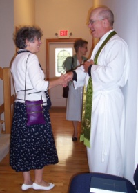 Pastor Greeting Congregants
